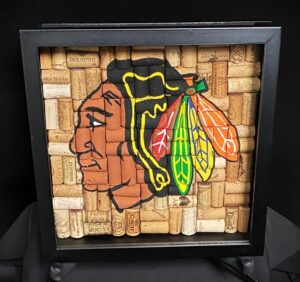 Chicago Blackhawks Indian Head logo hand painted on 12x12 wine bottle cork background mounted in shadowbox design